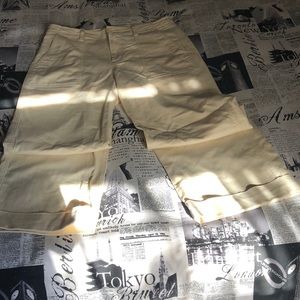 Cream, high rise, and wide leg pant.